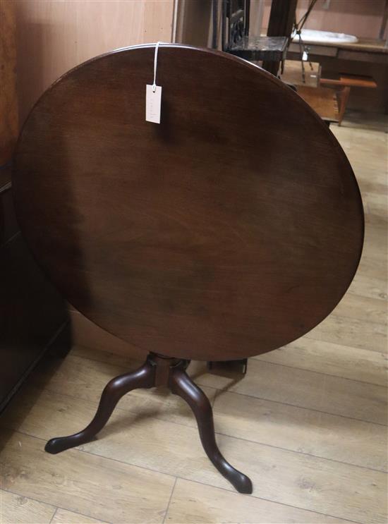 A George III circular mahogany tilt top tripod tea table Diameter 82cm